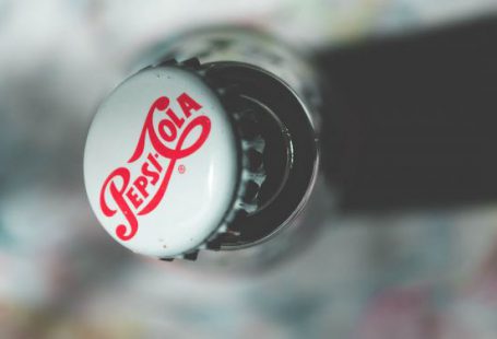 Branding - Shallow Focus Photography of Pepsi-cola Bottle Cap
