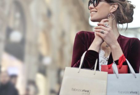 Branding - Photo of a Woman Holding Shopping Bags