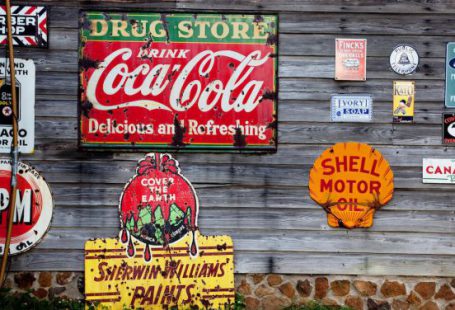 Advertising - Drug Store Drink Coca Cola Signage on Gray Wooden Wall