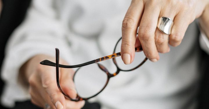 Analytics - Person Holding Brown Framed Eyeglasses