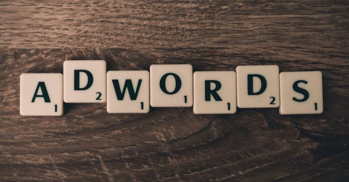 Advertising - Scrabble Forming Adwords on Brown Wooden Surface