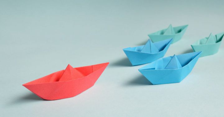 Leadership - Paper Boats on Solid Surface