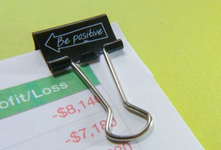 Revenue - Binder Clip on Paper with Profit and Loss Statement