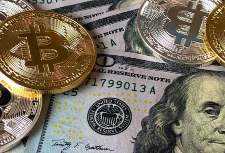 Investing - Bitcoins and U.s Dollar Bills