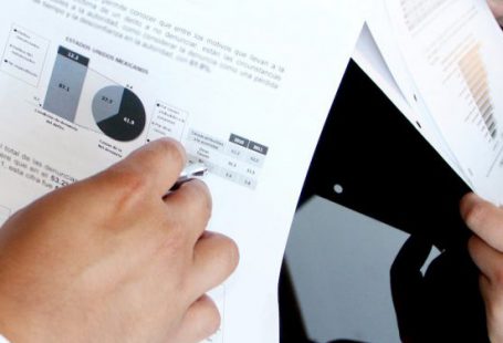 Analytics - Person Holding Document Papers