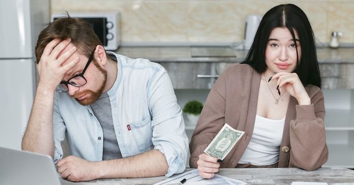 Budgeting - A Man and Woman doing Budgeting