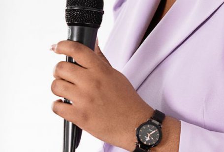 Leadership - A Woman Talking on the Microphone Giving a Speech